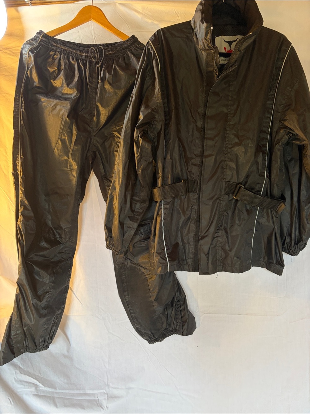 Ladies Motorcycle Rain Suit fits med to large with riding gear under.